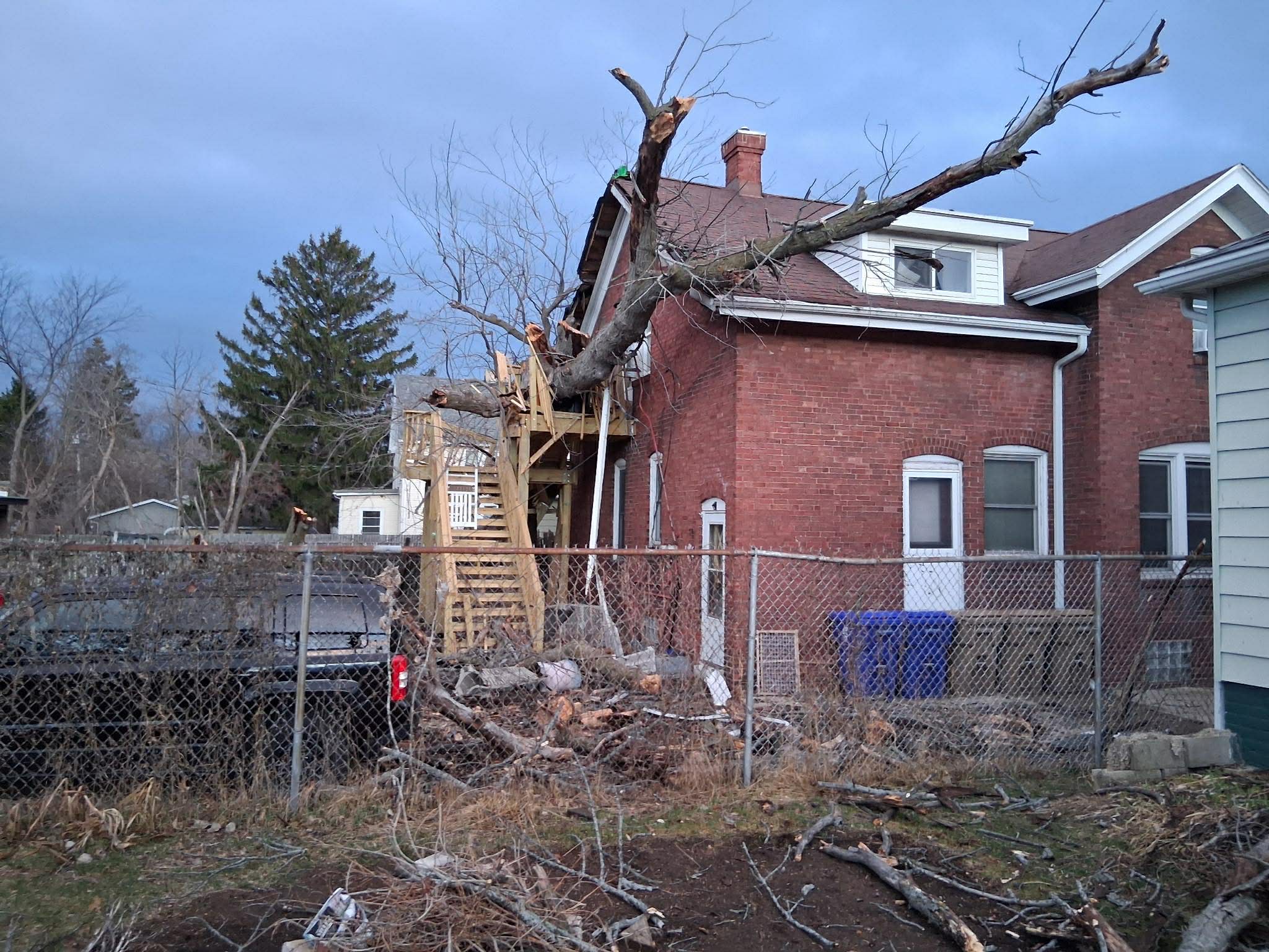 Storm Damage—In Photos: Trees Down, Thousands Without Power After ...